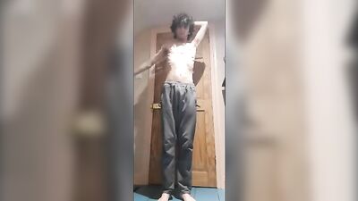 Curly-haired amateur twink enjoys a solo session, covering his body in piss and finally giving himself a messy facial