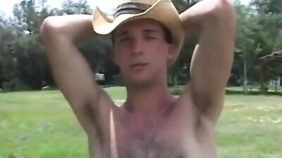 Rural athletes engage in a nude wrastlin, then swappin spit with one another