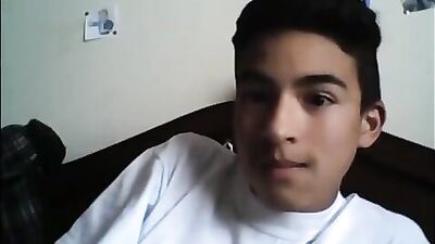 Latino Teen Cums Solo While Jerking Off His Huge Cock in Bed
