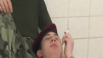 Young soldiers give head-shaking blowjobs while their bodies are ravaged by rough, military-themed gay sex