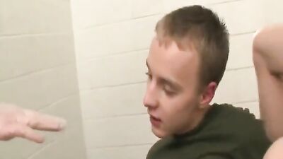 Young soldiers give head-shaking blowjobs while their bodies are ravaged by rough, military-themed gay sex