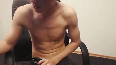 Young man with a subtle erection on an amateur webcam