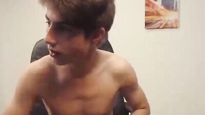 Young man with a subtle erection on an amateur webcam