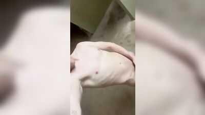 Man jerks off on camera in a public restroom