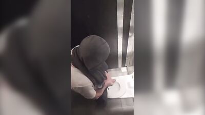 Straight Voyeur Spots 4 Guys Jerking in the Public Toilet: An Amateur Cam Captures the Action on a Hidd*en Camera