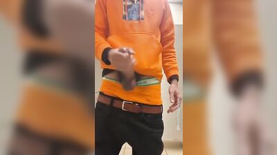 Eager young man pleasures himself with his hand