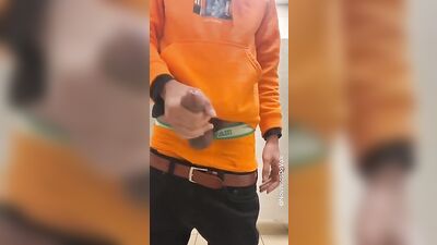 Eager young man pleasures himself with his hand