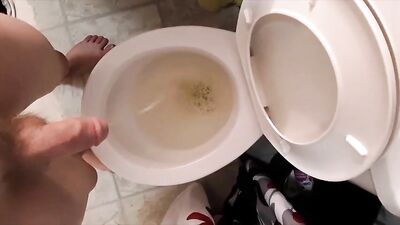 A Blonde Athlete Shines in an Intimate Moment of Peeing