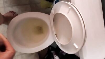 A Blonde Athlete Shines in an Intimate Moment of Peeing