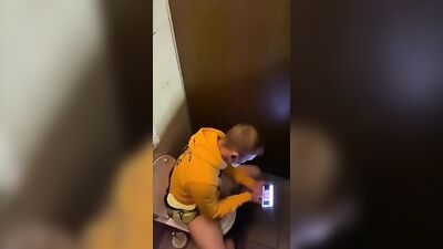 Jerks and Jerkoffs in the Public Restroom: An Amateur Spy Video