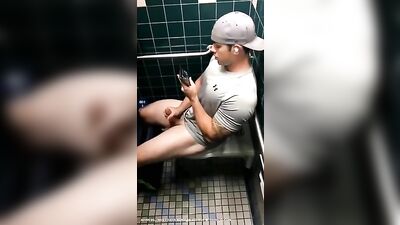 Hand Job and Cum Shot in the Mens Room - A Spy Watches!