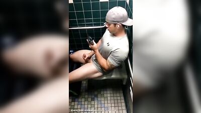 Hand Job and Cum Shot in the Mens Room - A Spy Watches!