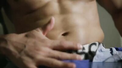 Muscular athlete pleasuring himself with a group of gay teenage boys, featuring endless streams of cum