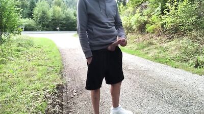 Biker Boy Blows Cum Rocket Near Busy Street