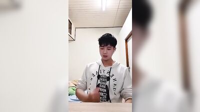 Young Chinese Webcam Boy Pleasures Himself in Public!