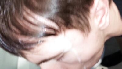 Young dick cruising twink whore takes an older man's load on face & in mouth at public male restroom