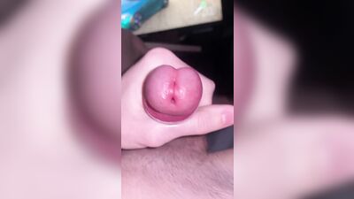 Young guy jerks off his uncut dick after gaming