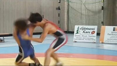 Muscular Hunks In Skintight Suits Engage In Rough And Tumble Play