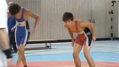 Muscular Hunks In Skintight Suits Engage In Rough And Tumble Play