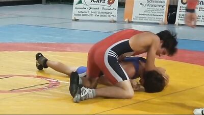 Muscular Hunks In Skintight Suits Engage In Rough And Tumble Play