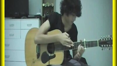 Guitar-Playing Cutie Gets Seduced By Strapping Lads!