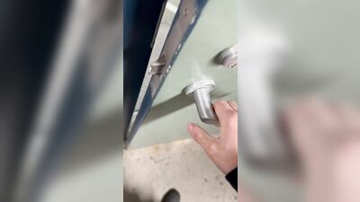 Twink jerks off in parking garage and blows load