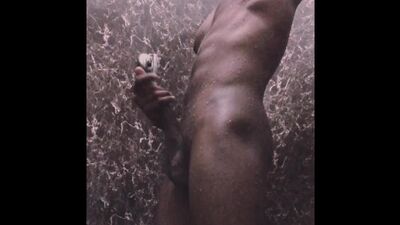 Muscular big ass twink with bbc masturbating while shower