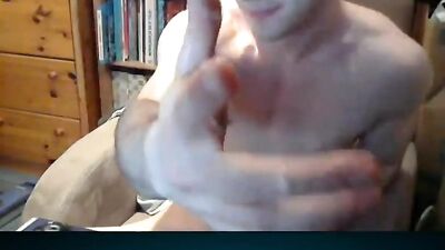 Handjob Amateur Cum Shots on His Sofa: An Intense Gay Porn Experience!