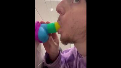 Sucking dildo in gas station bathroom
