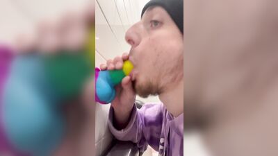 Sucking dildo in gas station bathroom