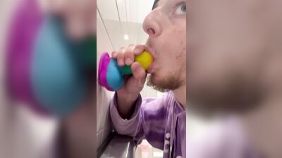 Sucking dildo in gas station bathroom