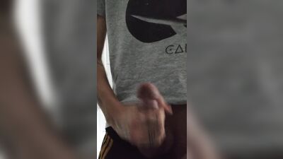 Young skinny guy jerking off and cumming in his hand