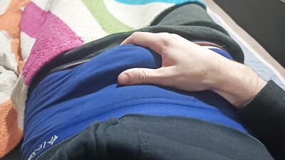 Guy in blue underpants plays with his dick, rubs his dick