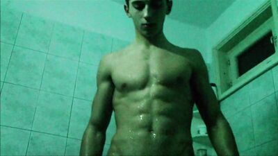 Muscle Worship: Teen Flexes in Store Changing Room Showers