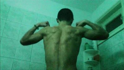 Muscle Worship: Teen Flexes in Store Changing Room Showers