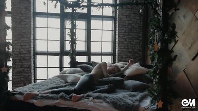 Seductive leather twink in leggings playing with cock on the bed