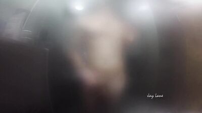 Twink jerks off and presses cock against glass in steamy shower session