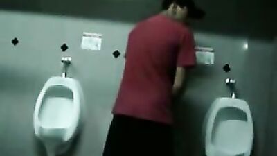 Young masturbating in public toilets
