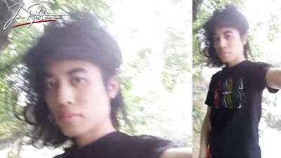 Jon Arteen walks in a gay cruising park, wanks, cums outdoors in front of water. Horny twink public