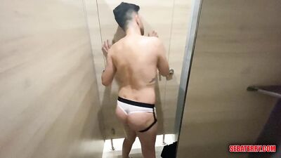 sucking the coach's cock in the locker room bathrooms