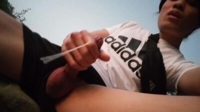 Pissing, jerking, cumming, this boy has an orgasmic evening outdoors on a rocky beach