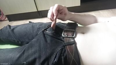 Boy in jeans jerks off his insatiable cock