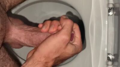 nightly cum shot into toilet while girlfriend is next door