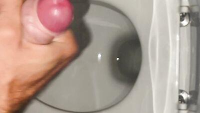 nightly cum shot into toilet while girlfriend is next door