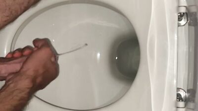 nightly cum shot into toilet while girlfriend is next door