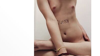 leashed twink boy plays with his cock when left alone