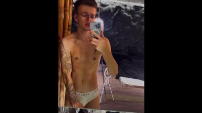 Gay tattooed twink Michael Moore showing off his body and playing with it