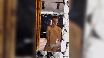 Gay tattooed twink Michael Moore showing off his body and playing with it