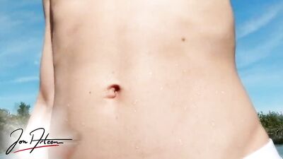 Naughty boy goes in the water with white undies to make them see his wet dick bulge through beach