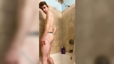 Muscle twink showers and plays with cock. Full video on OF: Pup.stud20